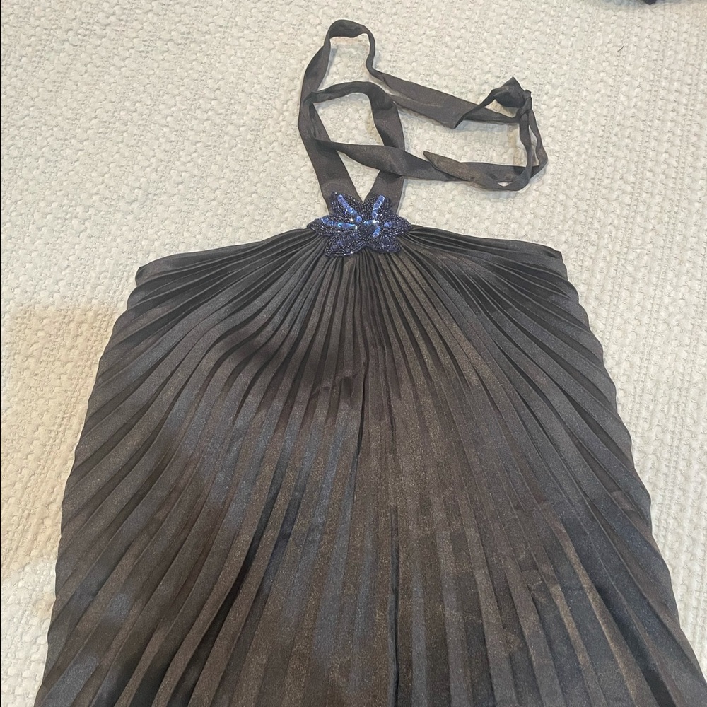 Silk pleated halter.Embellished on front Neverworn